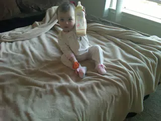 Liesl Handing Me Her Bottle