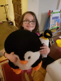 Luciana with Stuffed Penguis
