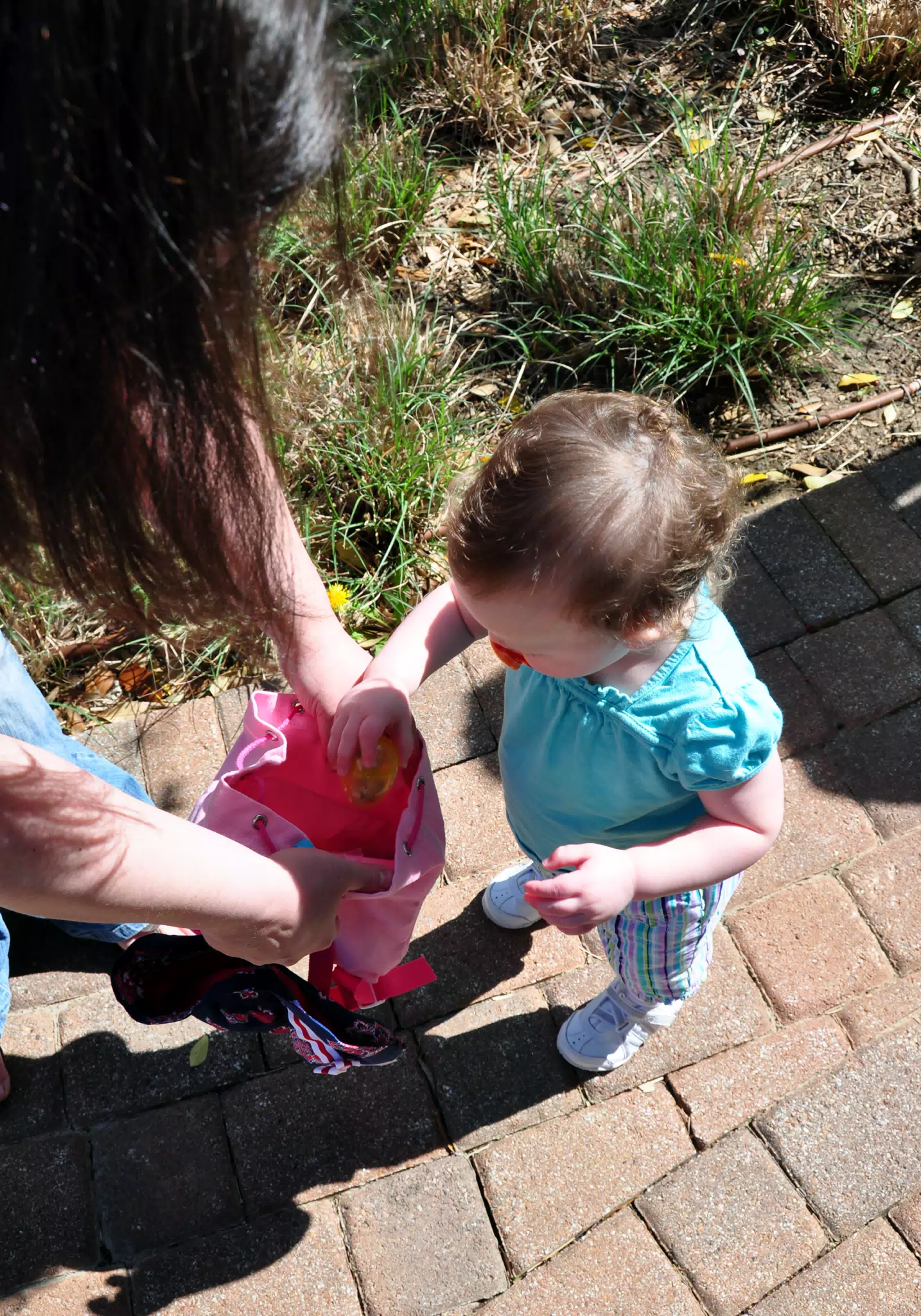 Liesl Putting Egg into Bag
