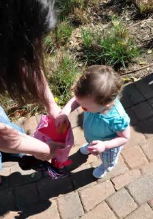 Liesl Putting Egg into Bag