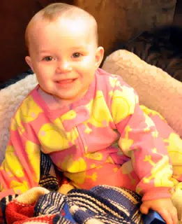 Liesl Playing in Oreos Bed