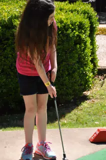 Liesl Playing Miniature Golf