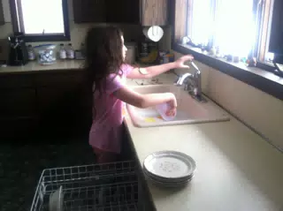 Liesl Doing Dishes at Grandpa's
