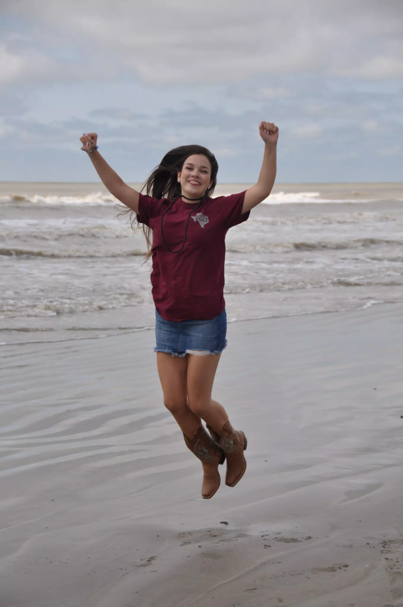 Girl in Denim Miniskirt on Beach Jumping, Teen Brunette