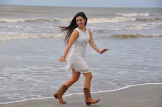 Emily Running from the Water in Cowboy Boots and White Dress on Galveston Beach