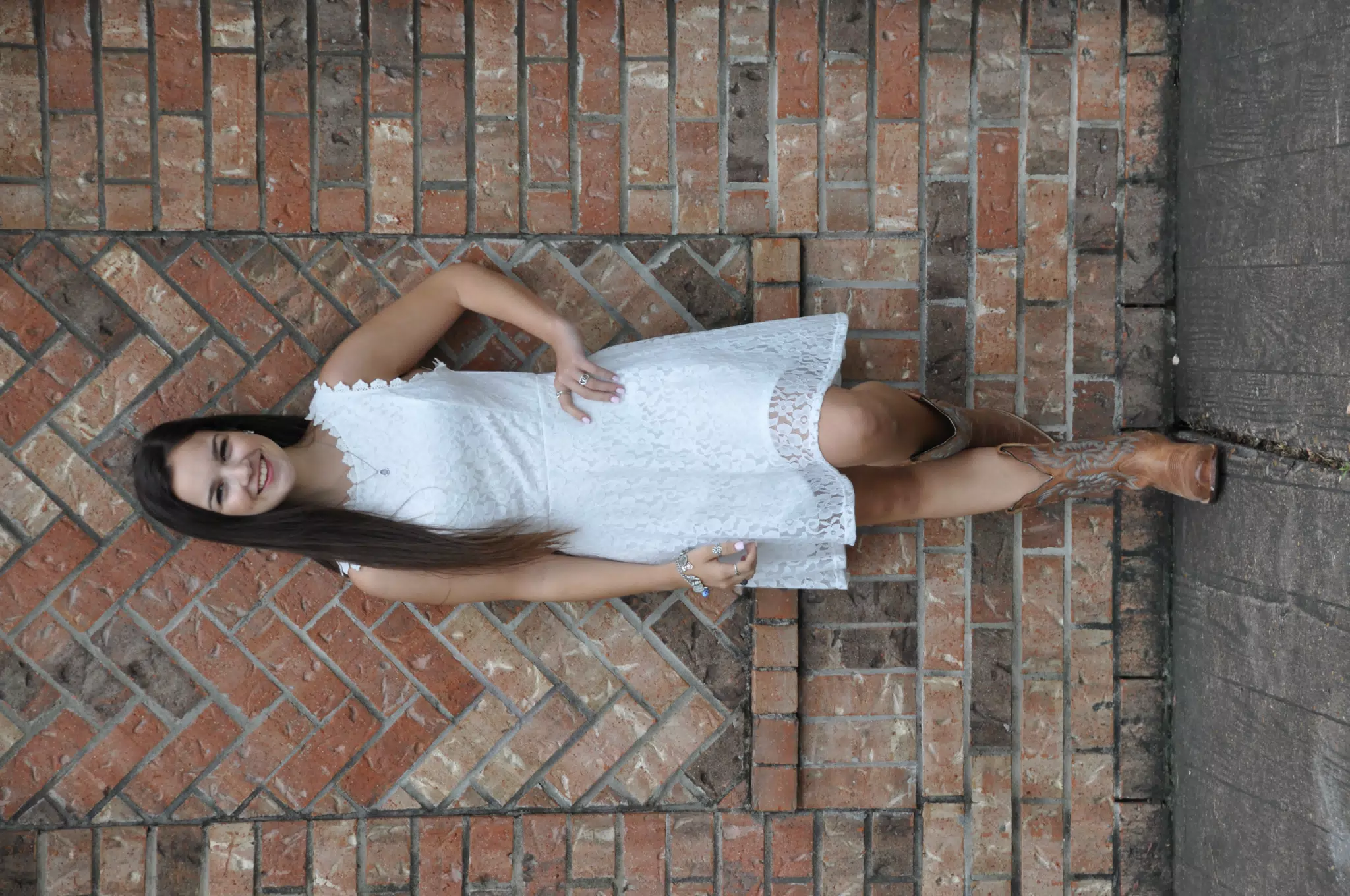 Teen Model in White Dress by Brick Wall