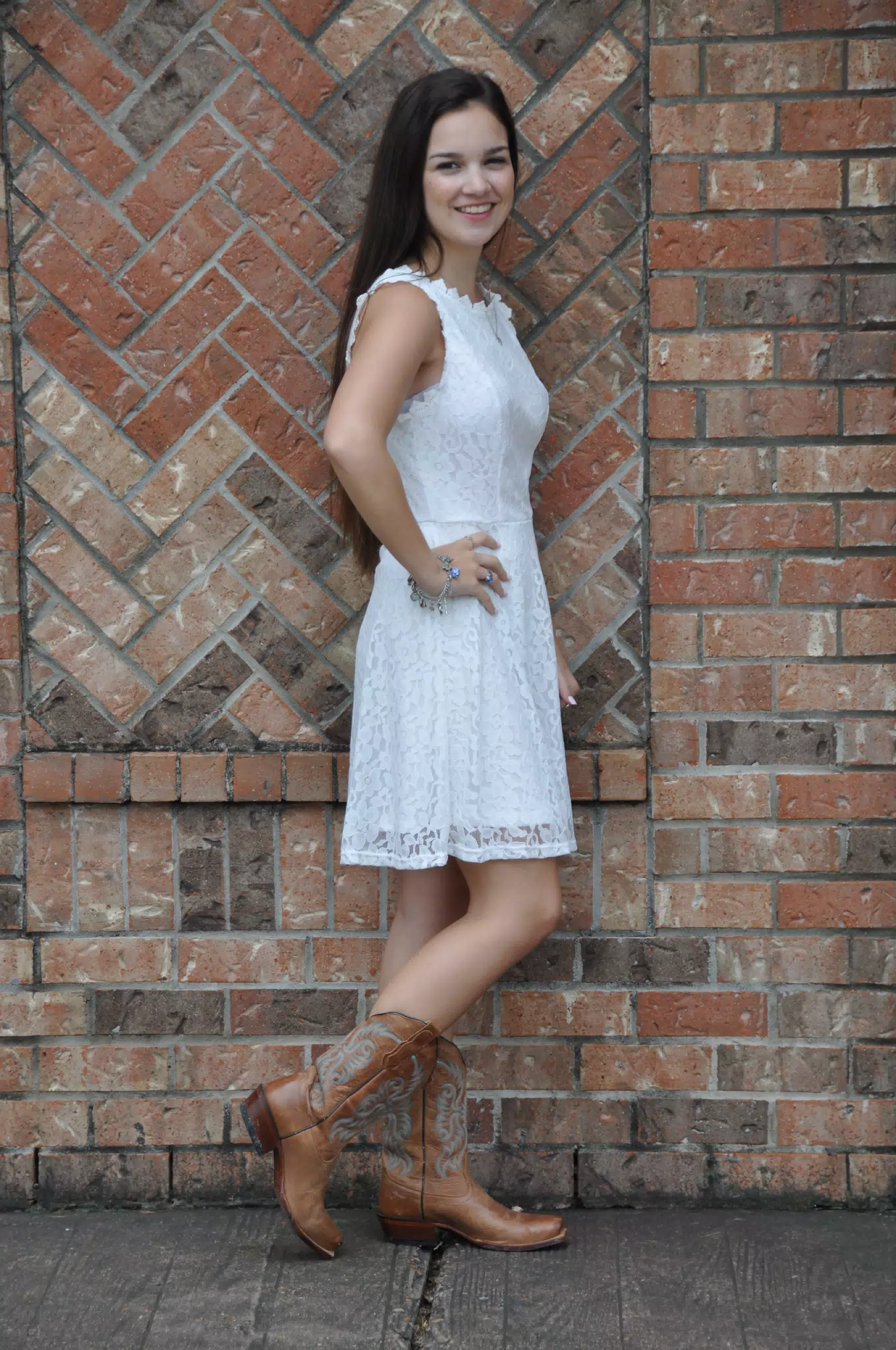 Teen Model with Cowgirl Boots and White Dress