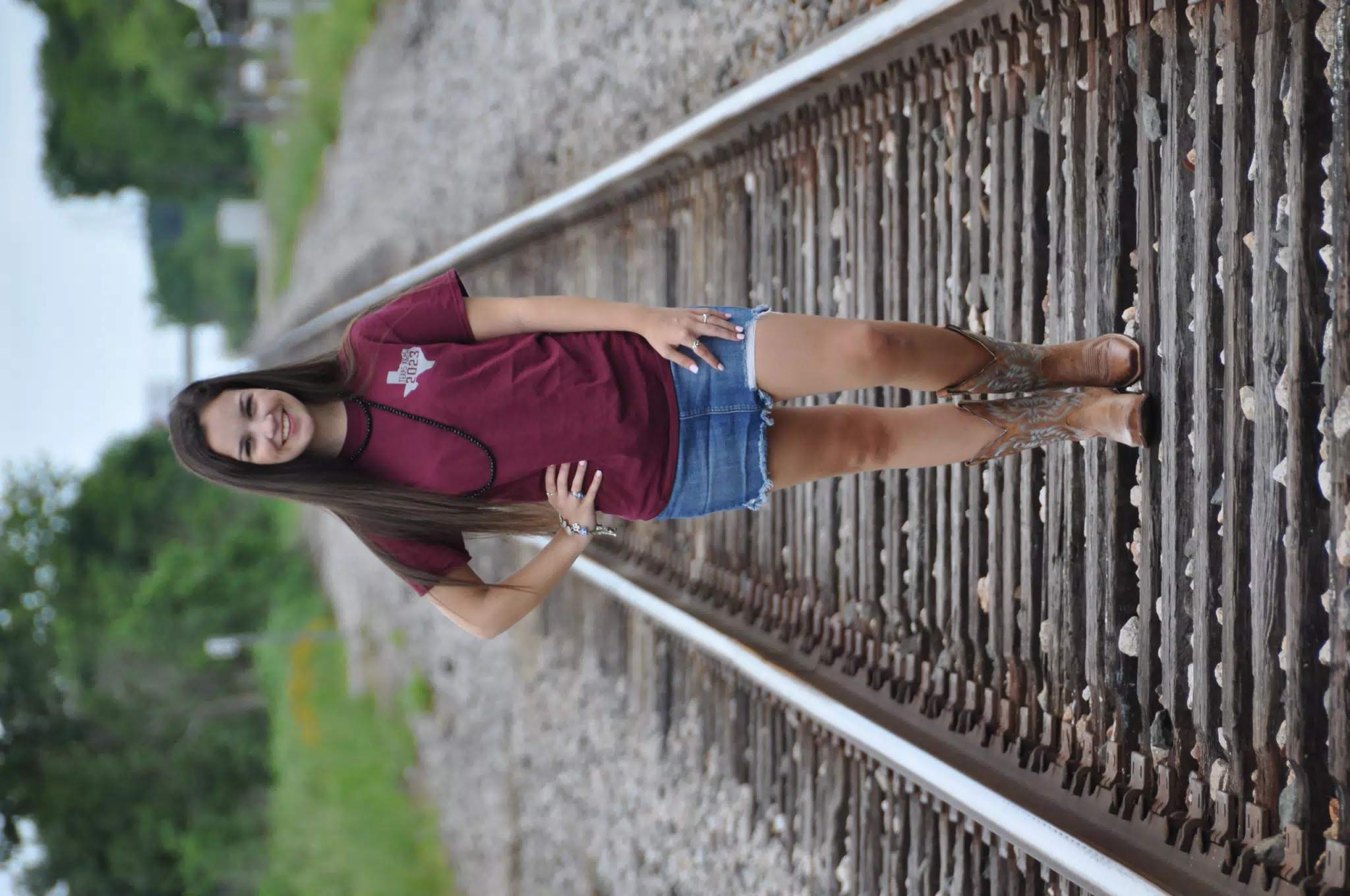 Teen Model in Denim Mini Skirt on Train Tracks in Galveston