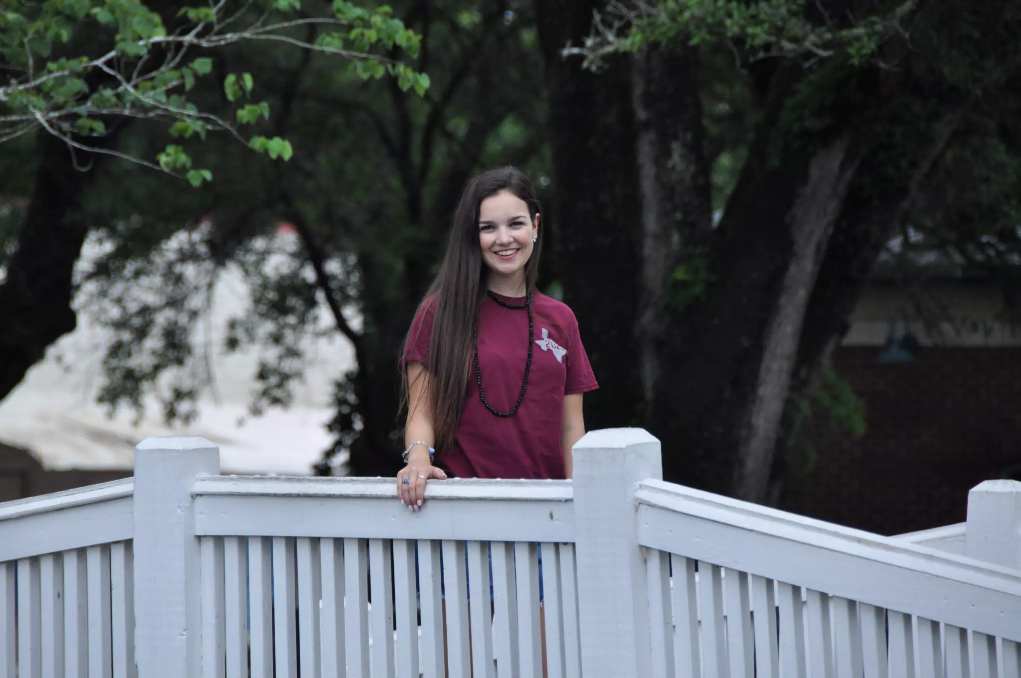 Brunette Teen Model on White Bridge