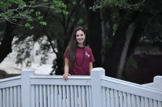 Brunette Teen Model on White Bridge