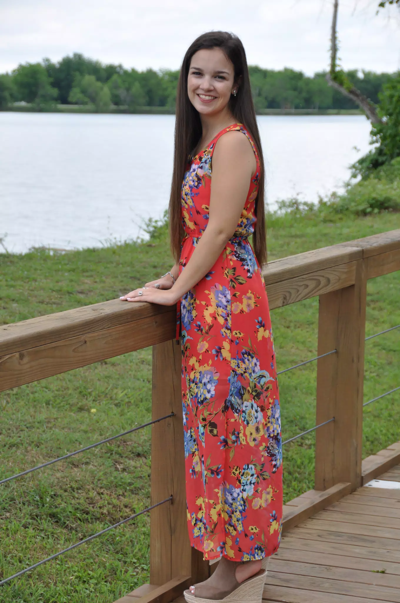 Teen in Red Dress on Boardwalk