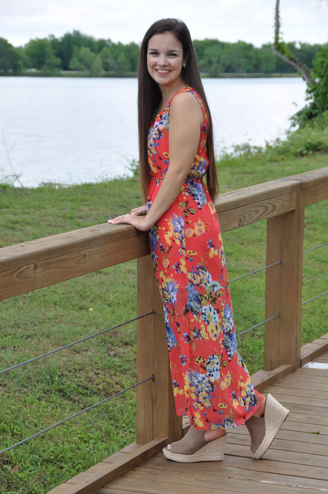 Brunette Model in Red Floral Dress by Pond in Texas