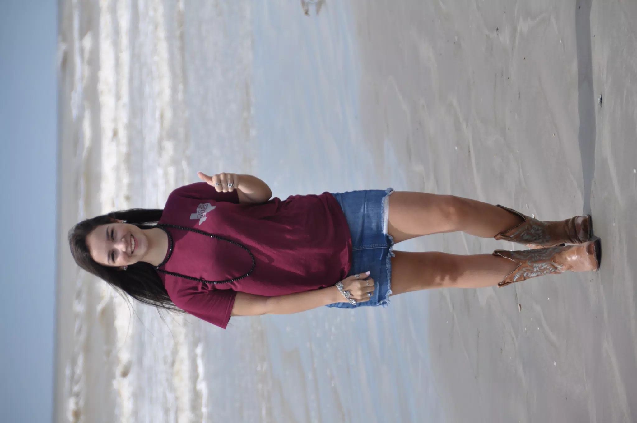 Emily Thumbs Up on Galveston Beach
