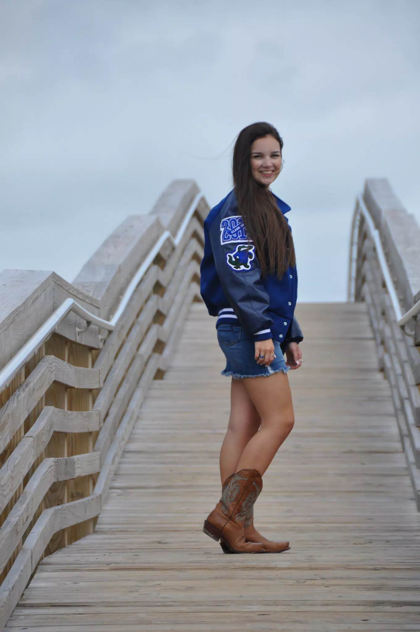 Teen Brunette Model on Galveston Boardwalk in Cowboy Boots and Denim Skirt