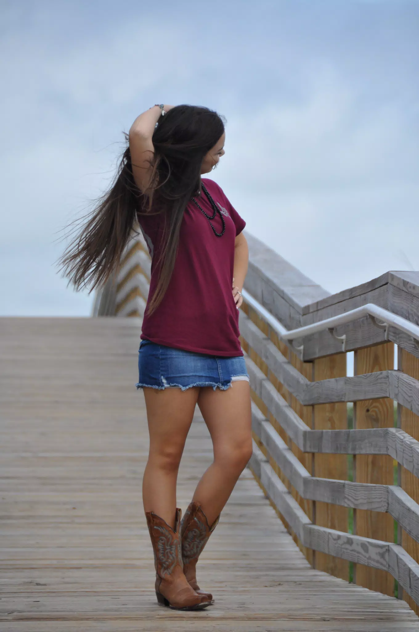 Model Adjusting Hair on Galveston Boardwalk