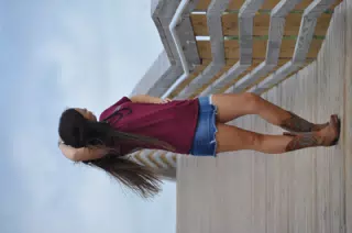 Model Adjusting Hair on Galveston Boardwalk