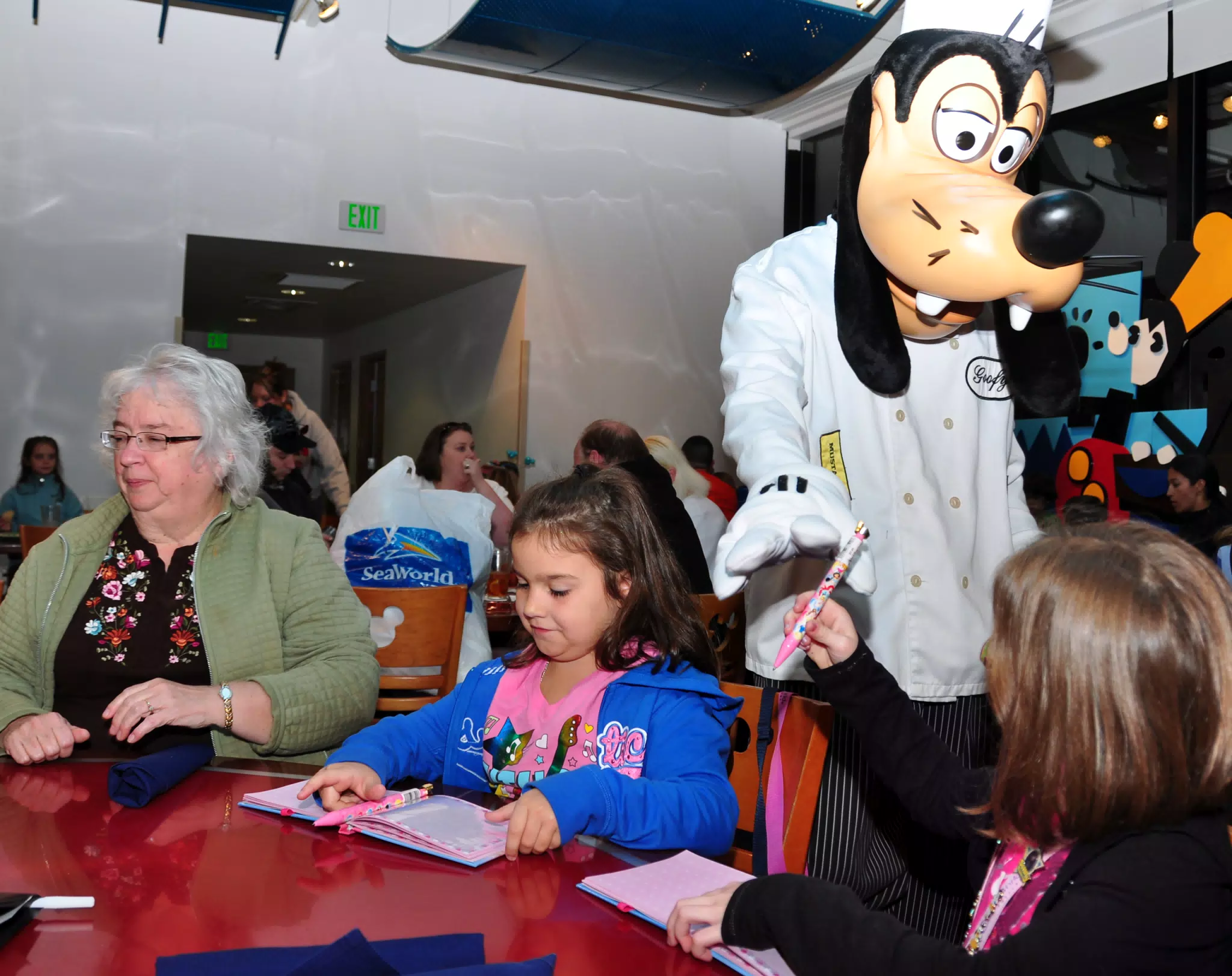 Chef Goofy Signing Autographs at Chef Mickeys