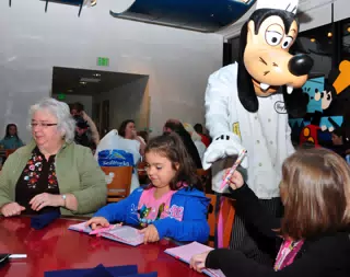 Chef Goofy Signing Autographs at Chef Mickeys