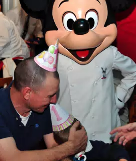 Bennie Shielding Garrett from Mickey Mouse