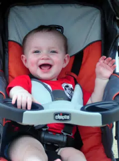 Liesl Laughing in Stroller