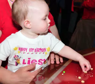 Liesl with Cereal at Birthday Party