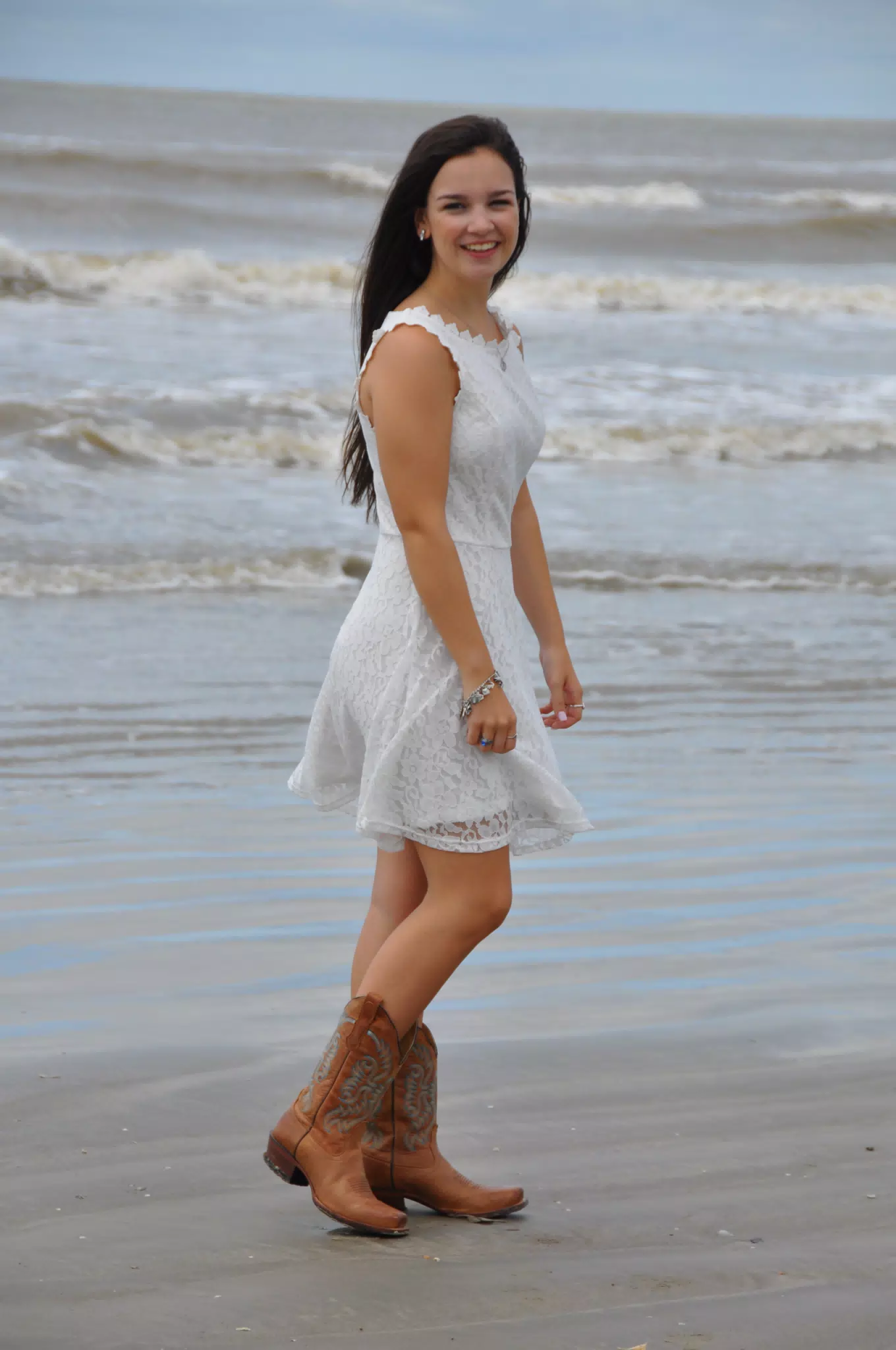 Model in White Dress and Cowgirl Boots on the Beach in Galveston