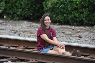 Teen Modeling on Railroad Tracks