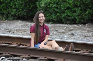 Teen Model on Train Tracks in Texas