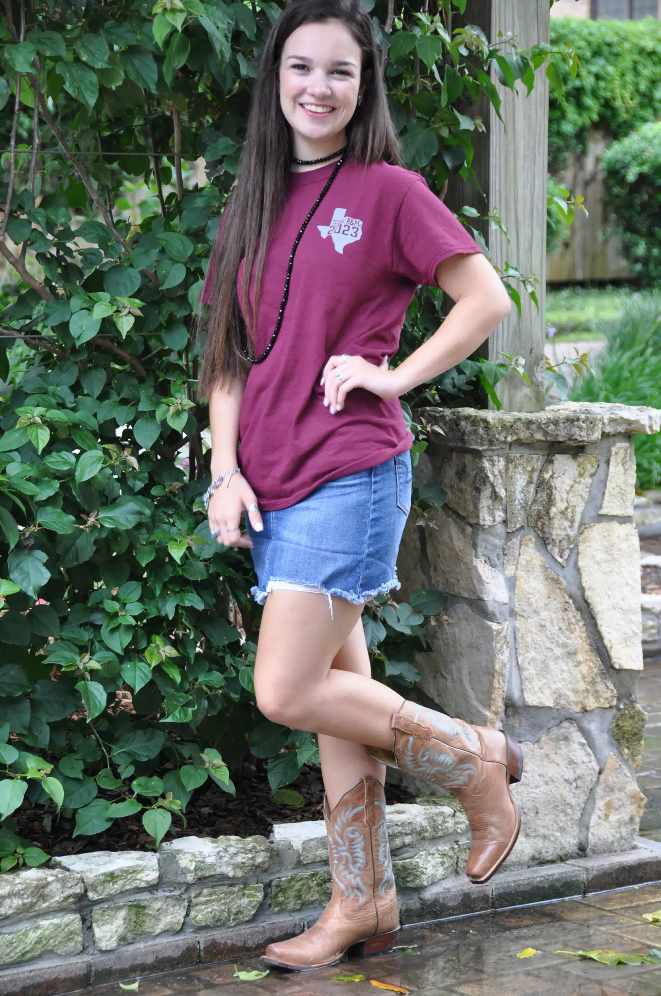 Emily in Boots and Denim Skirt by Ivy