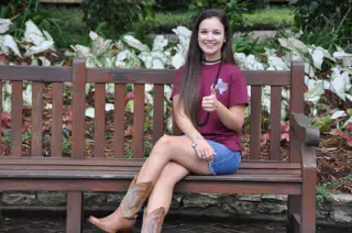 Girl Modeling on Park Bench