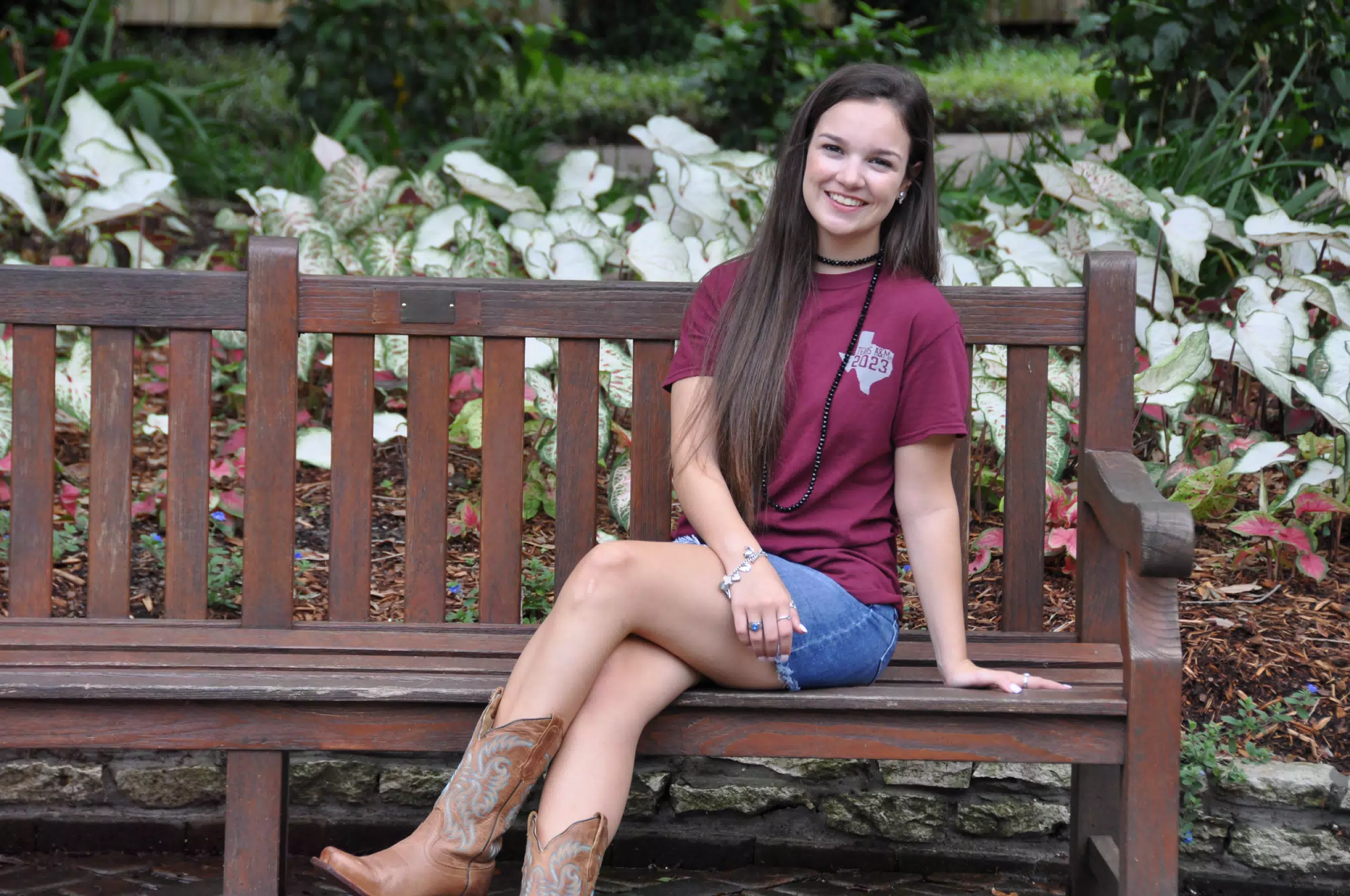 Young Model in Cowgirl Boots, Denim Skirt in Texas