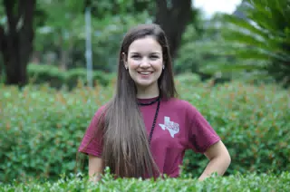 Teen Brunette Model Emily with Long Hair Posing in Park