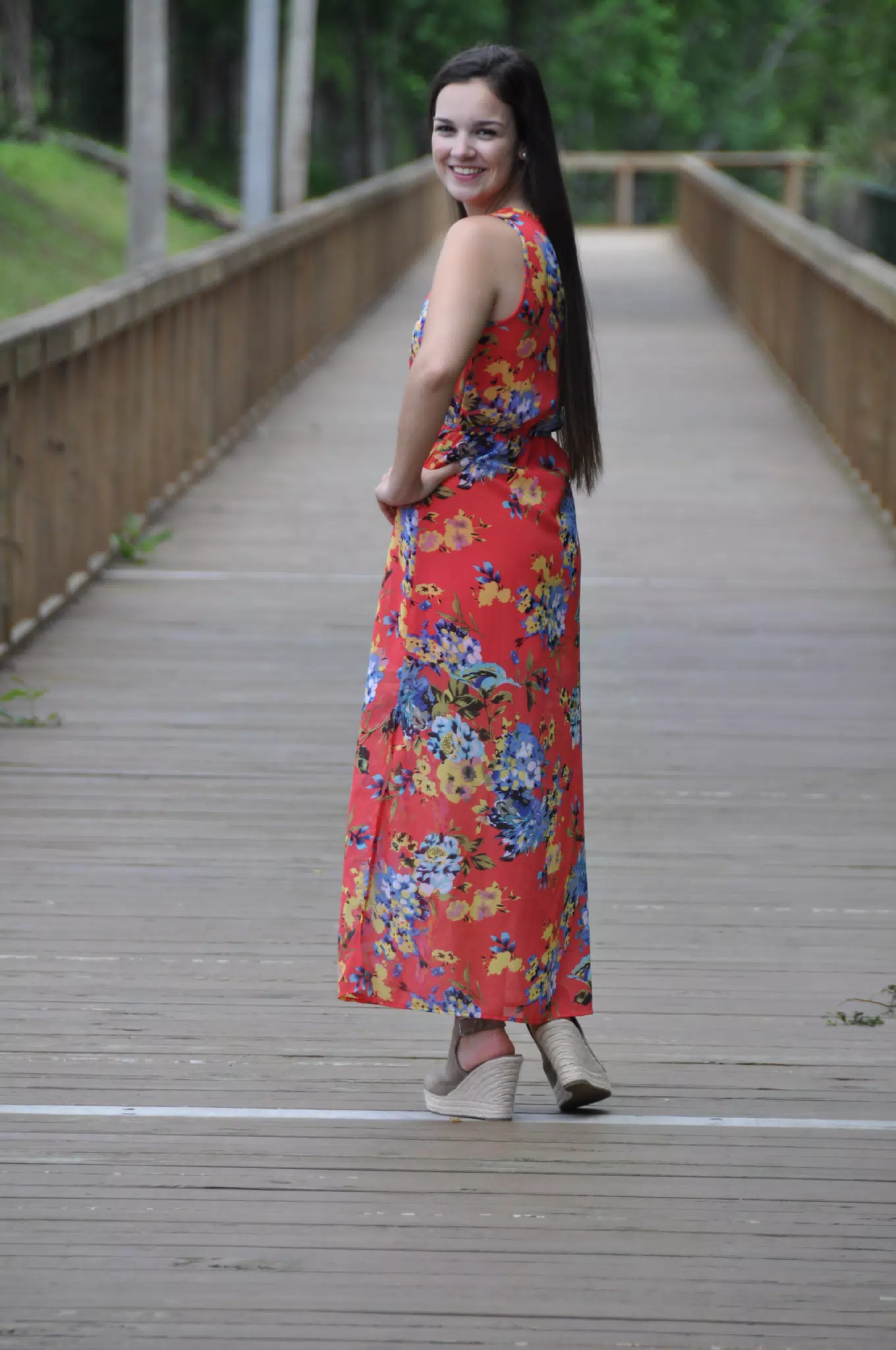 Teen Model in Red Dress Looking Back Over Shoulder
