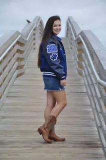 Emily Posing in Jean Skirt and Boots on Galveston Boardwalk