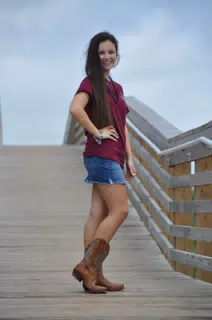 Emily in Jean Miniskirt and Cowboy Boots on Galveston Wood Bridge Model
