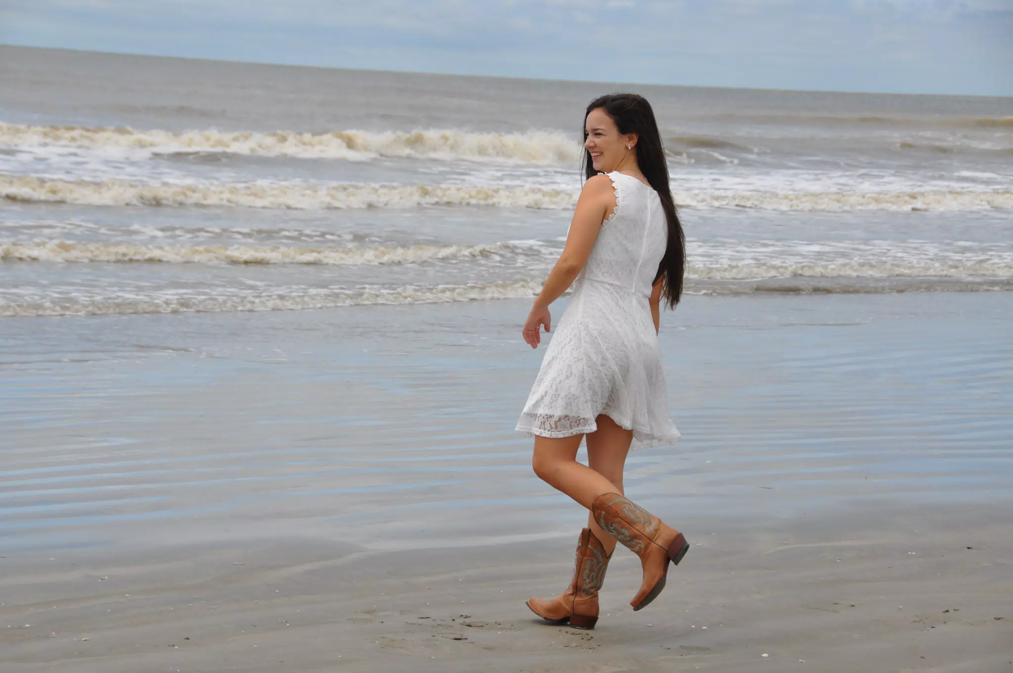 Emily Walking on Beach in White Dress