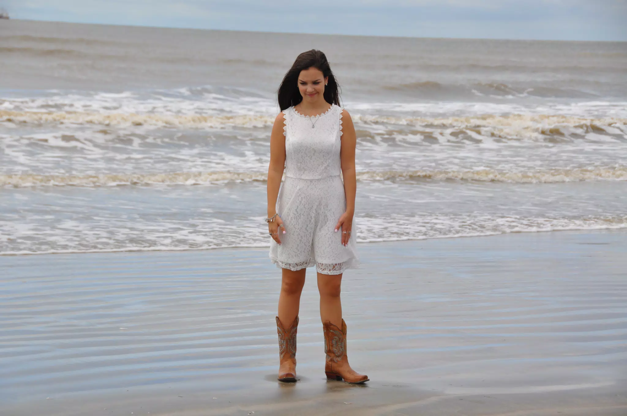 Frustrated Girl in White Dress on Beach