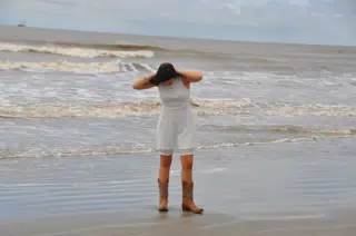 Emily Fixing Hair on Beach