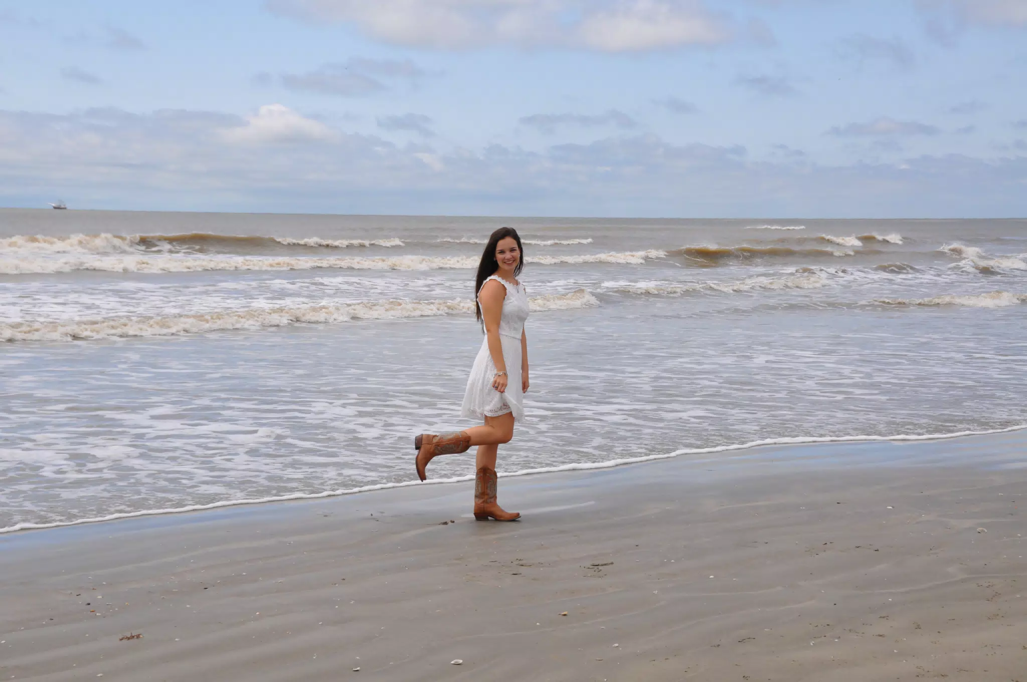 Girl in Boots on Beach