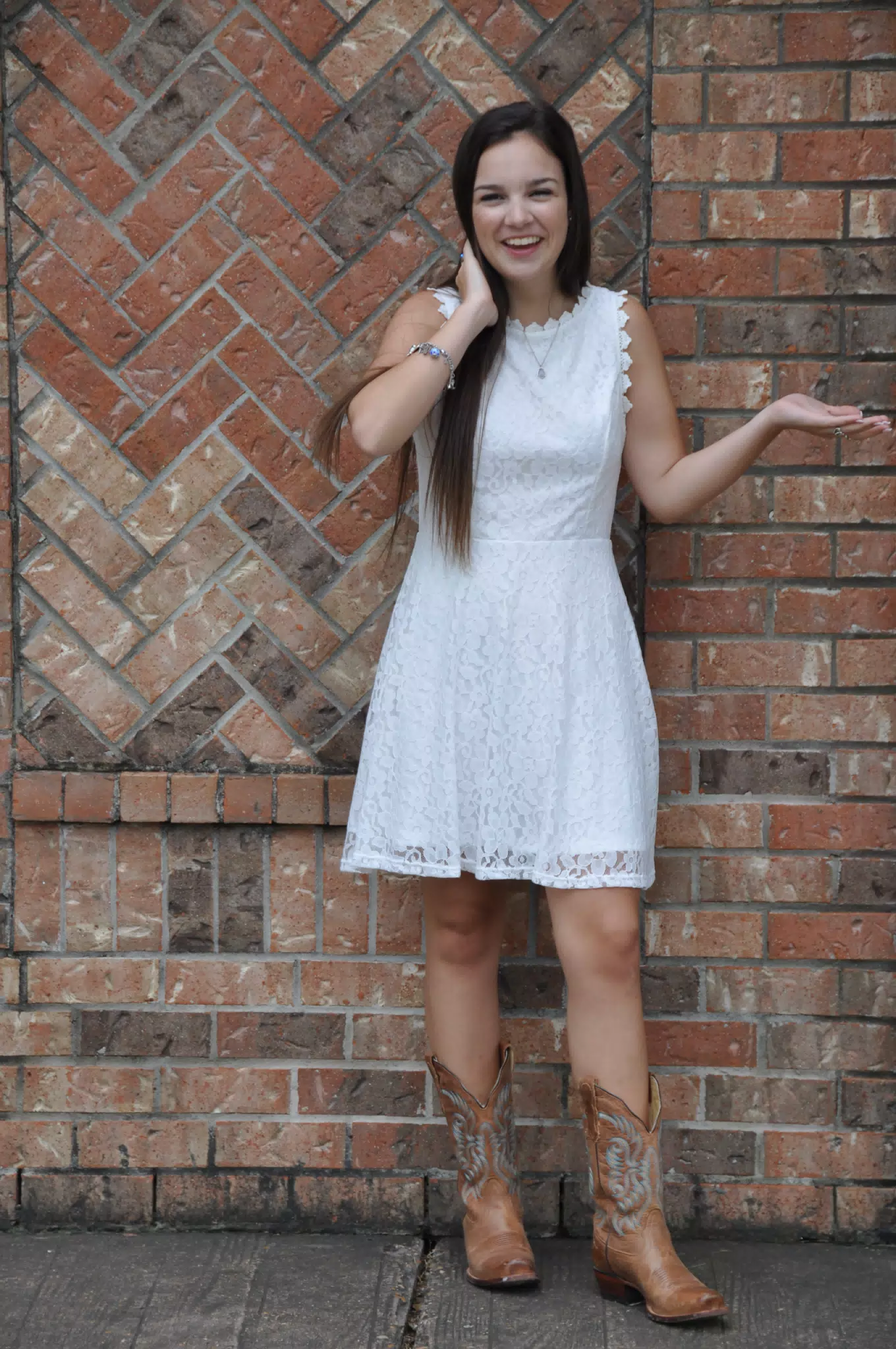 Teen Cowgirl in White Dress & Cowboy Boots in Texas Modeling