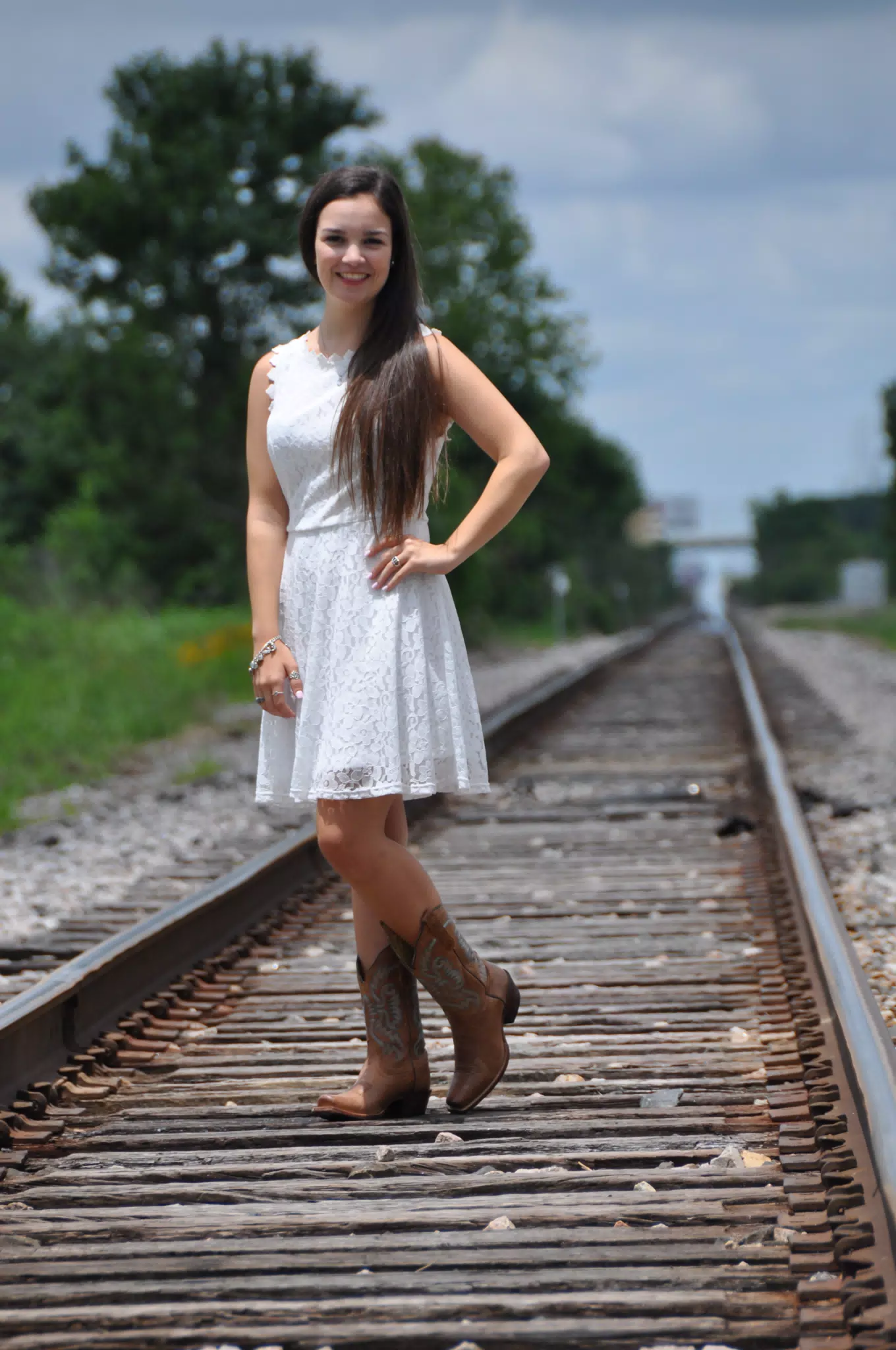 Harsh Light on Model in White Dress