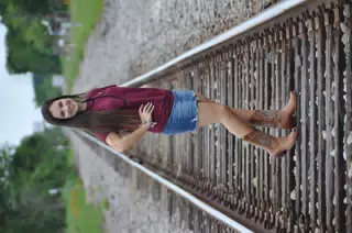 Cowboy Boots and Mini Skirt on the Train Tracks