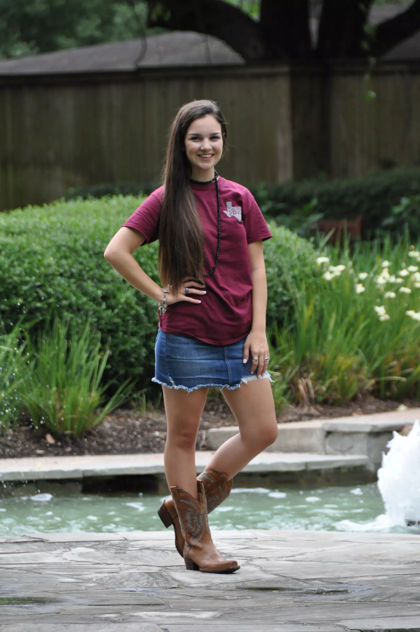 Model in Cowgirl Boots and Denim Miniskirt in Texas Park