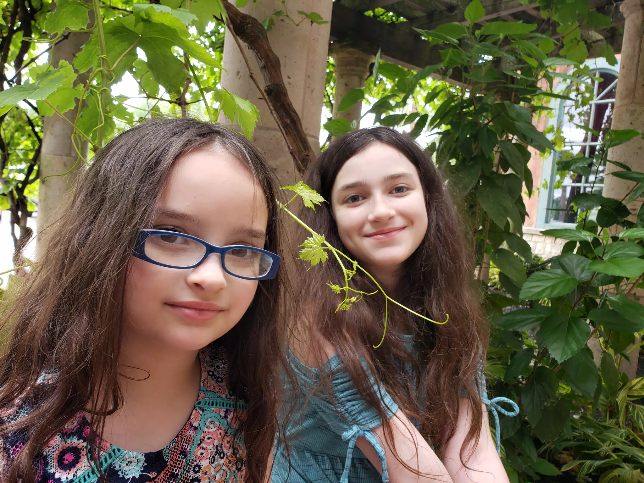 Luciana & Liesl Posing at Restaurant