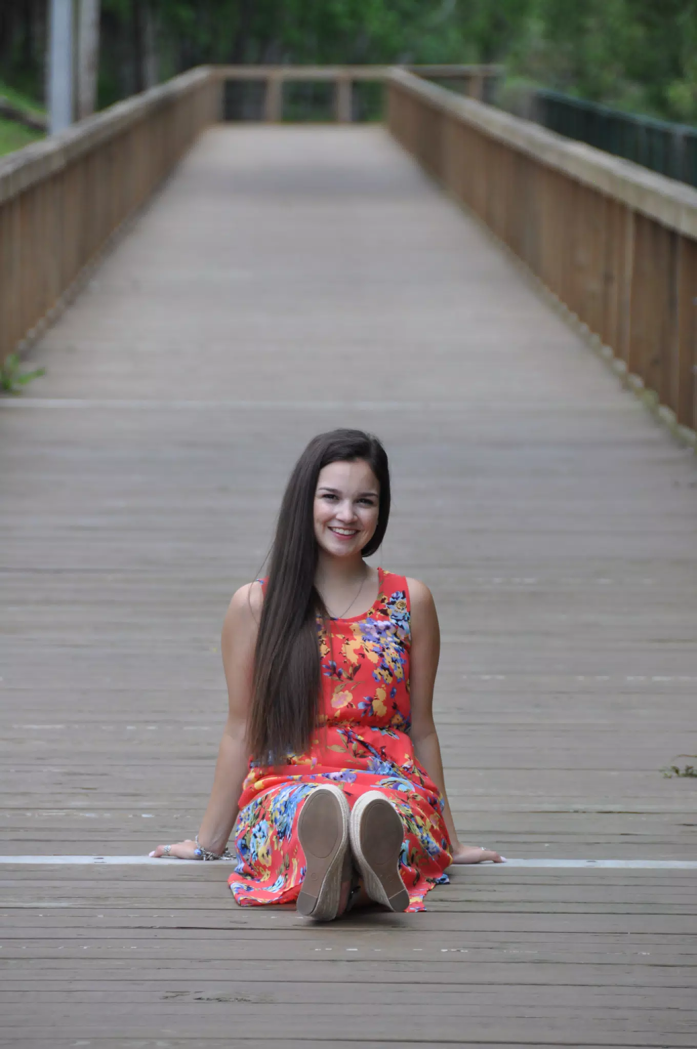 Long Haired Brunette Model in Red Dress on Boardwalk