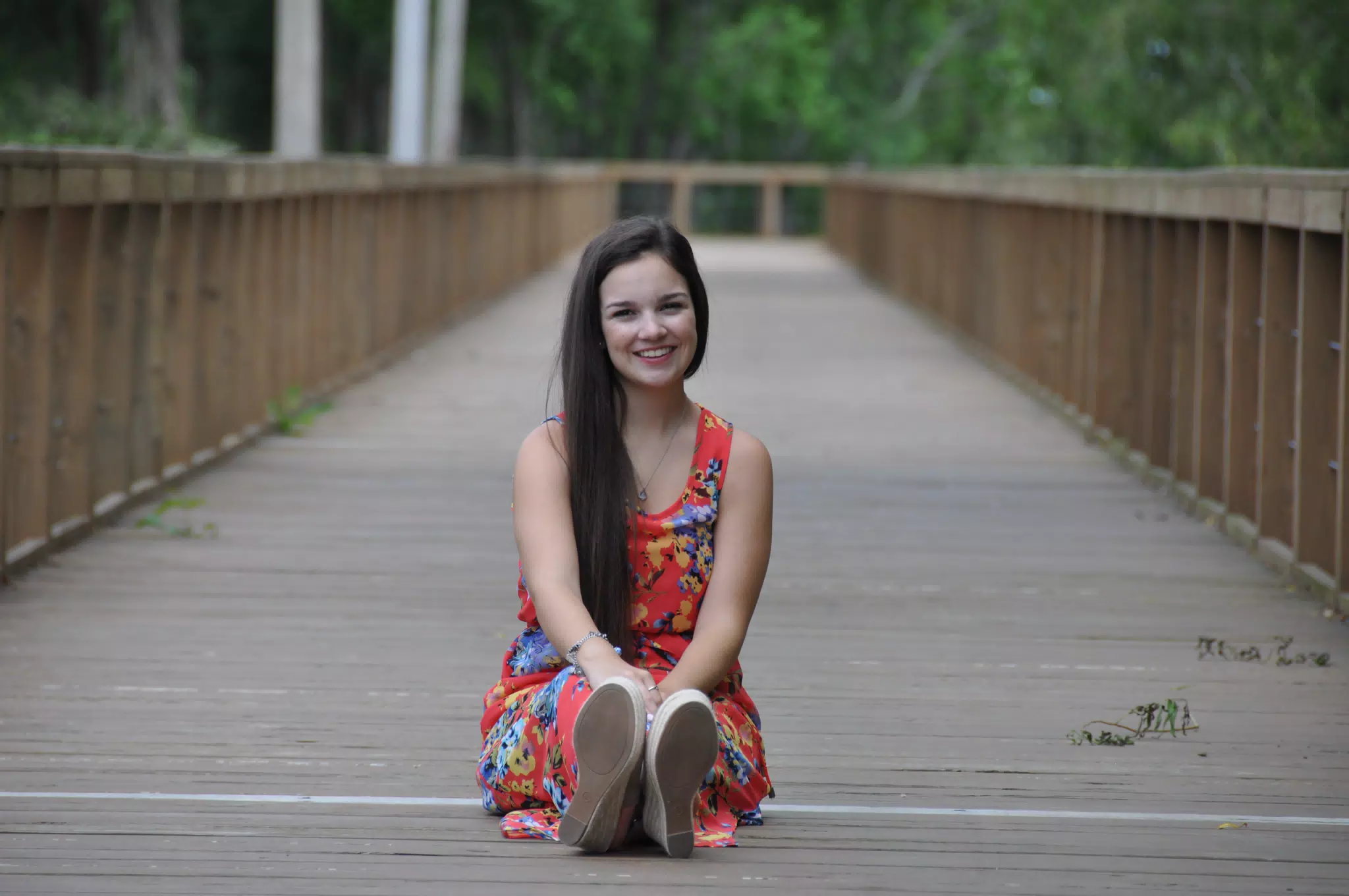 Emily in Red Dress on Boardwalk in Texas