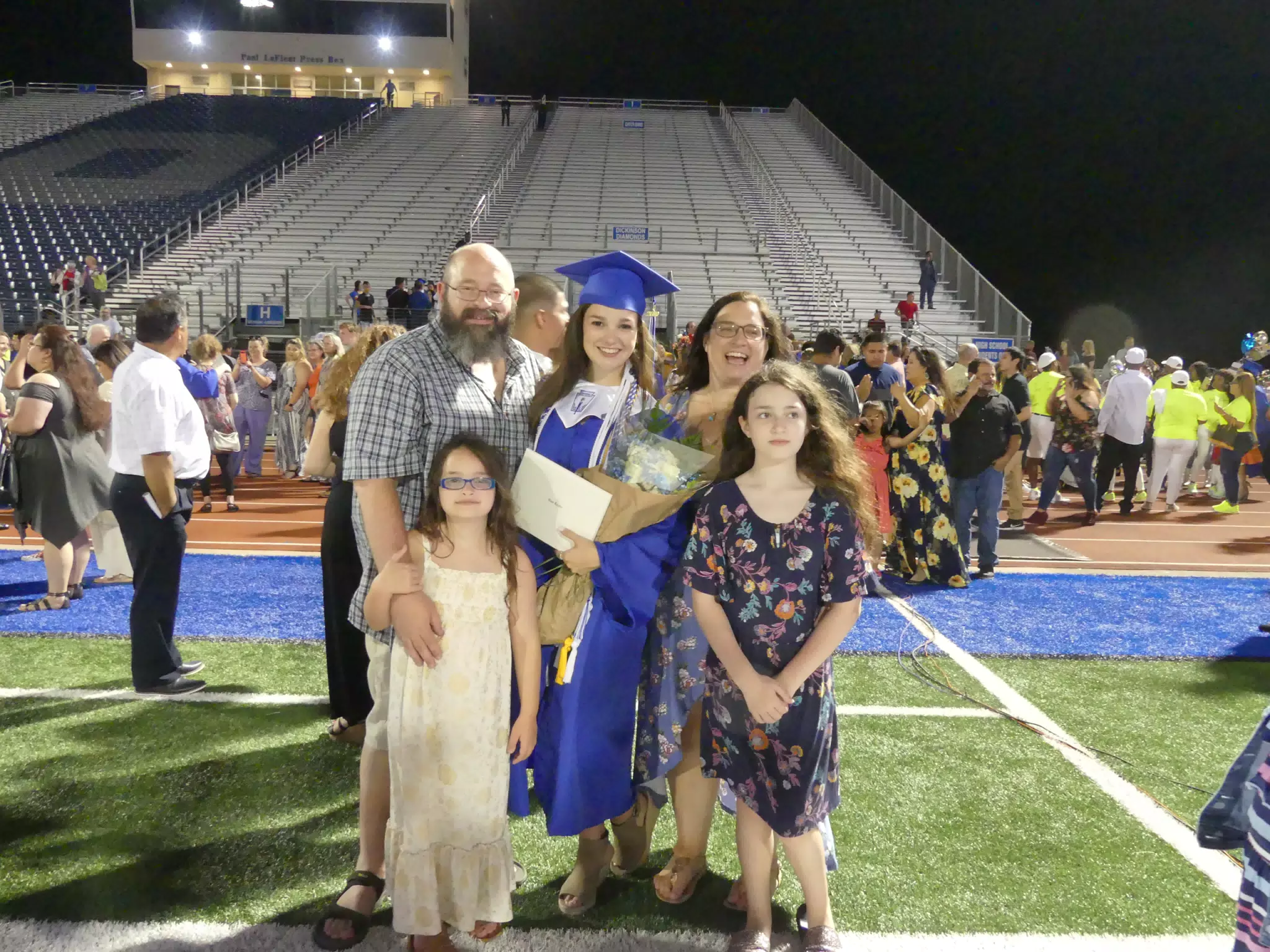 The Family with Emily at Graduation