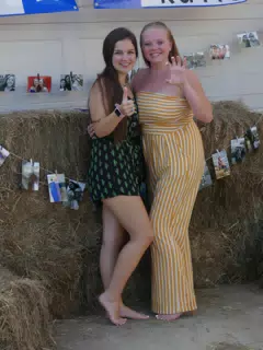 Emily and Kayla in Rompers with Hay Bails