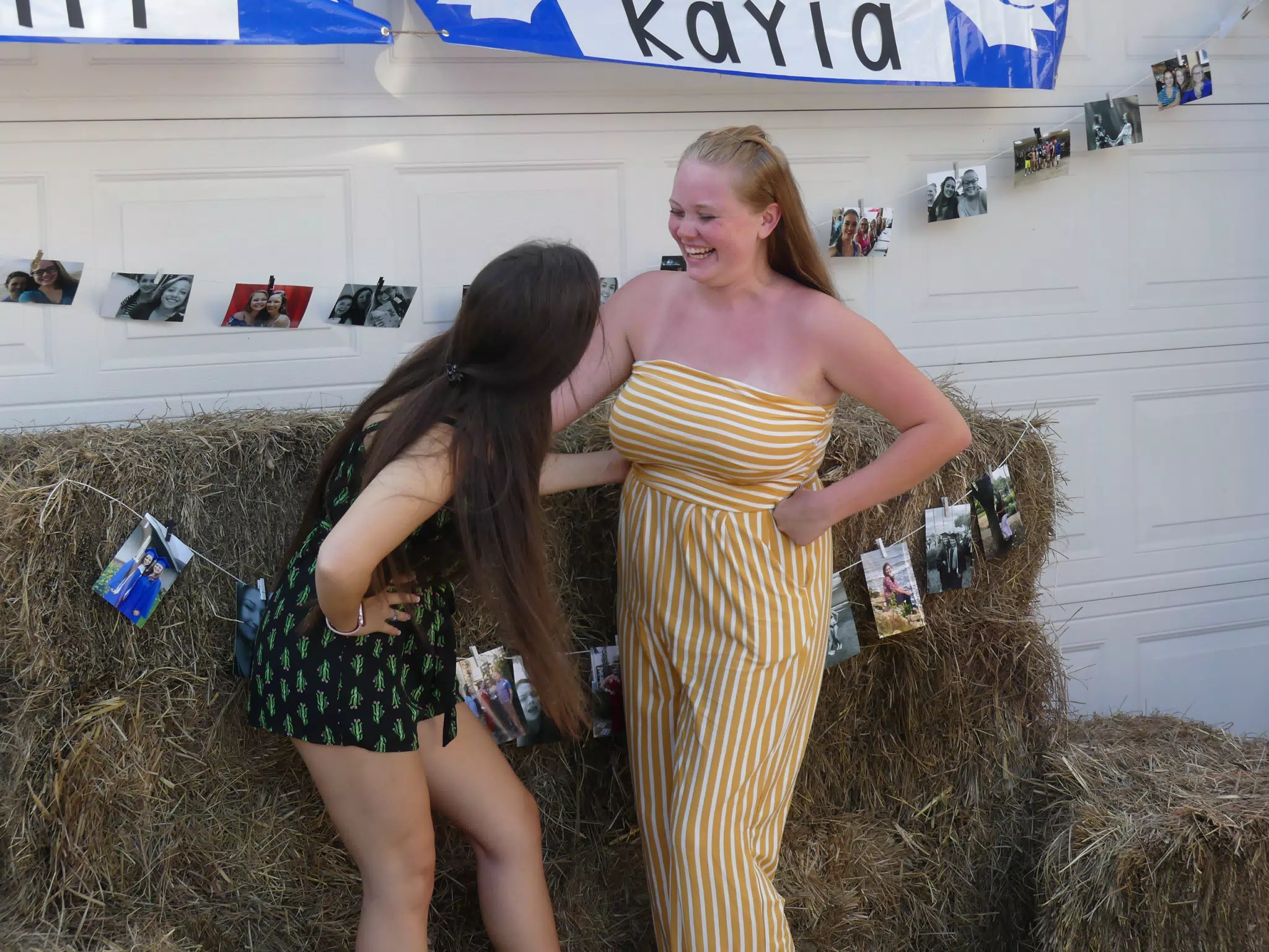 Girls Laughing with Hay