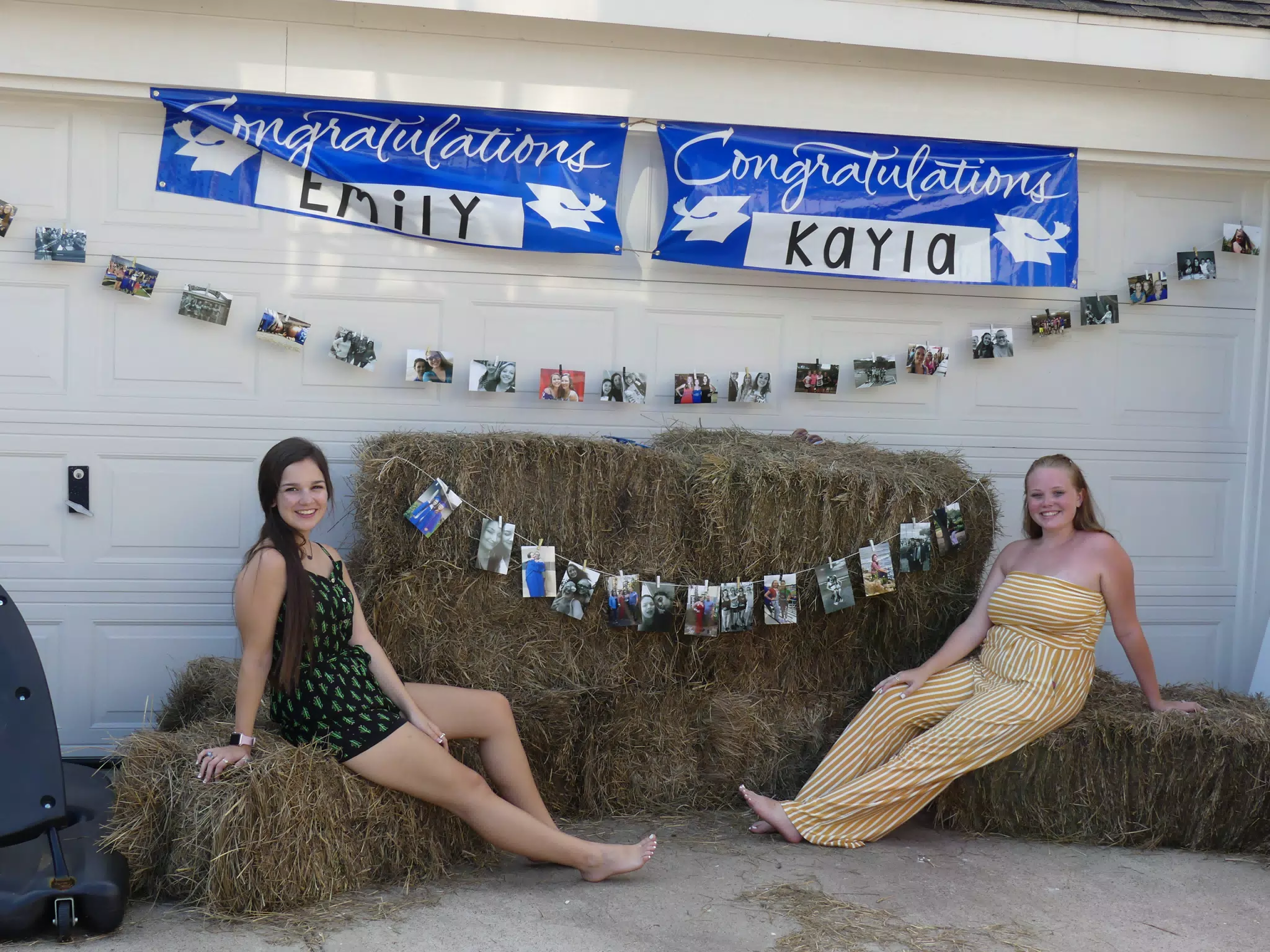 Emily and Kayla Reclining on Hay Bails in Texas